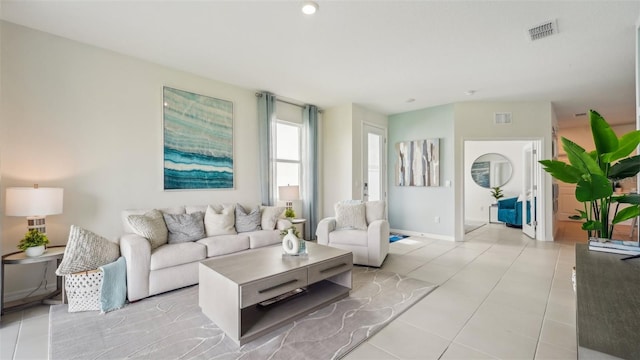 living room featuring light tile patterned flooring