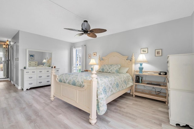 bedroom with ceiling fan and light wood-type flooring