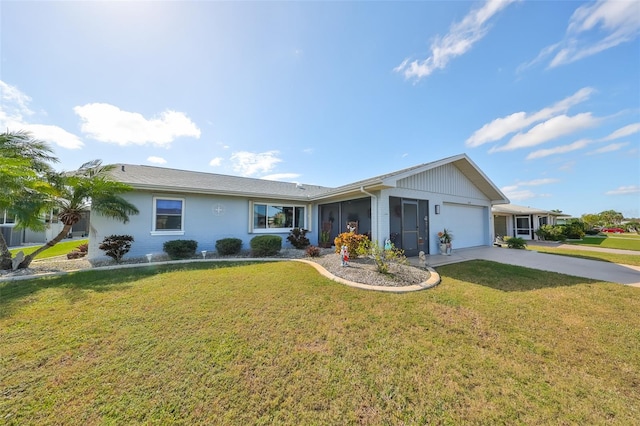 ranch-style home with a garage and a front lawn