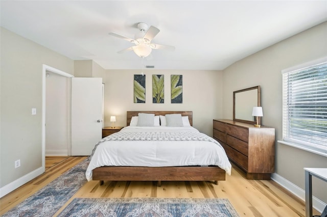 bedroom featuring ceiling fan and light hardwood / wood-style flooring