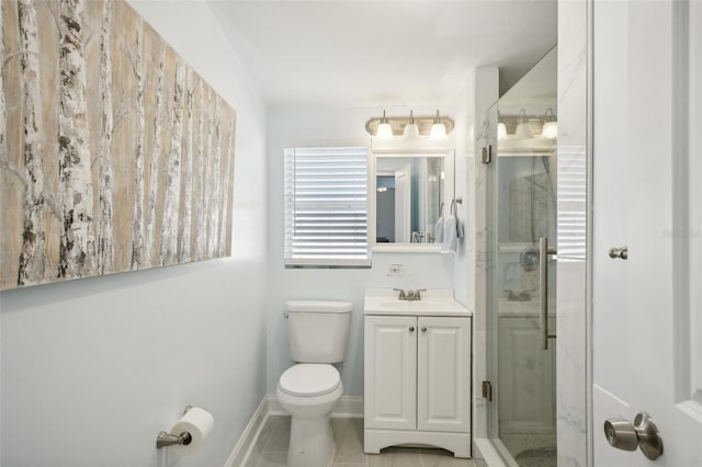 bathroom featuring walk in shower, vanity, and toilet