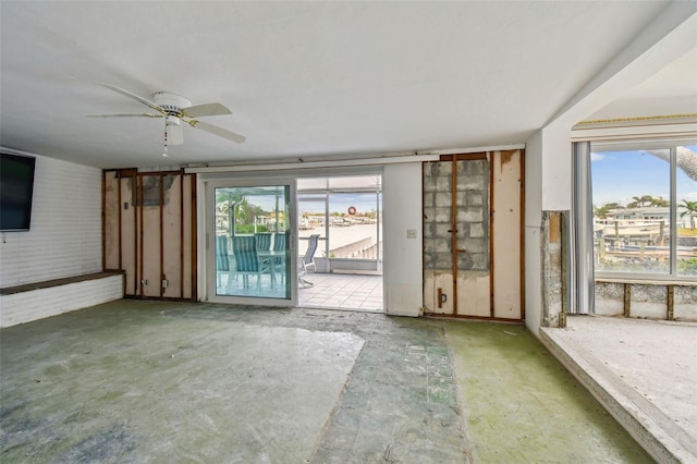 interior space featuring ceiling fan