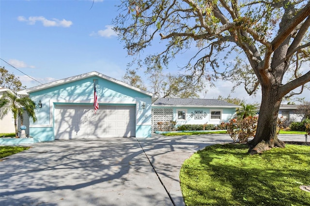 single story home with a garage