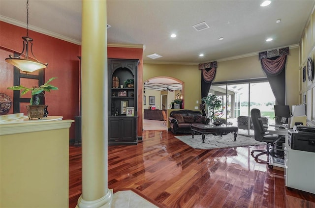 office with ceiling fan, ornate columns, dark hardwood / wood-style flooring, and ornamental molding