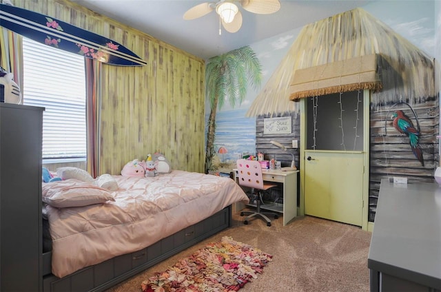 carpeted bedroom with ceiling fan