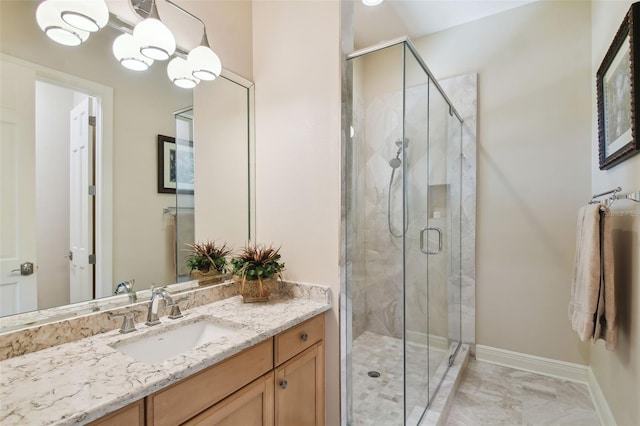 bathroom featuring vanity and walk in shower