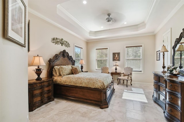 bedroom with a raised ceiling, ornamental molding, and multiple windows