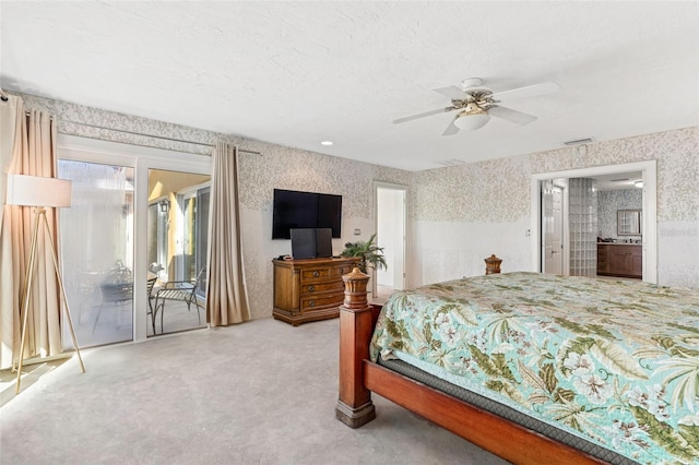 bedroom with visible vents, a ceiling fan, carpet floors, wallpapered walls, and access to exterior