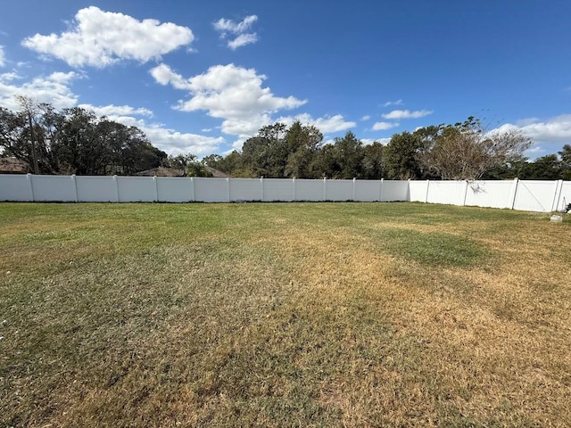 view of yard with fence