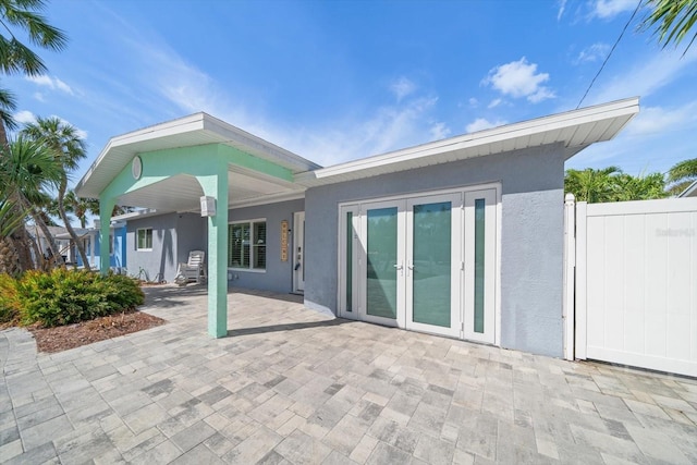 back of house featuring french doors and a patio area