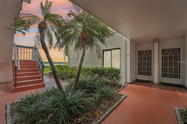 view of patio terrace at dusk