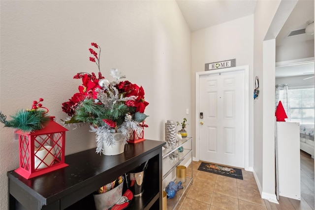 entrance foyer with tile patterned flooring