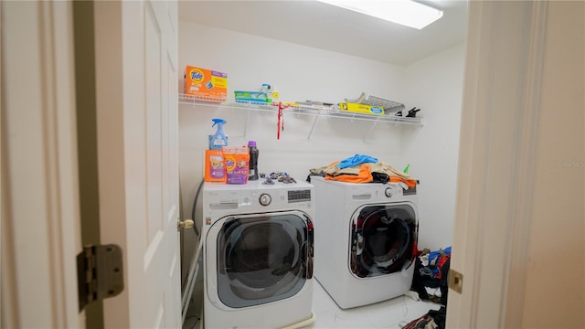 laundry room featuring independent washer and dryer