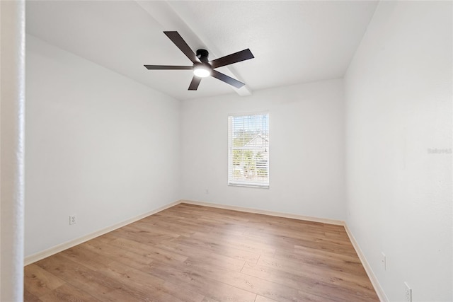 spare room featuring ceiling fan and light hardwood / wood-style flooring