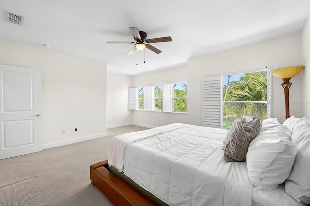 403 S Oregon Ave, Tampa, FL 33606 - carpeted bedroom with baseboards, visible vents, and ceiling fan