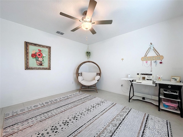 interior space featuring ceiling fan