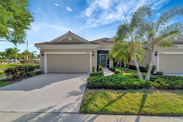 view of front of property with a garage