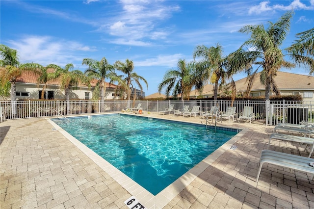 view of pool featuring a patio area