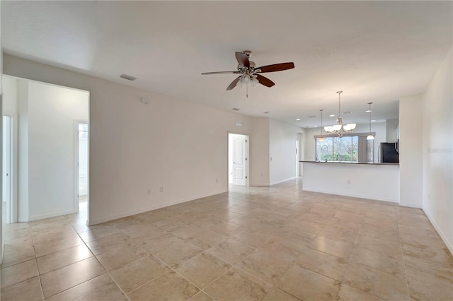 unfurnished living room featuring light tile patterned floors and ceiling fan with notable chandelier