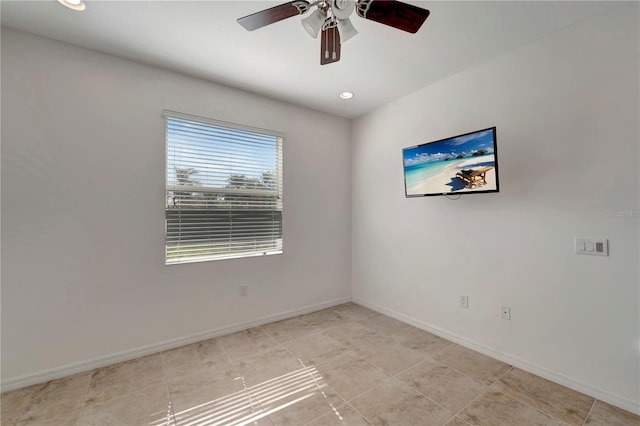 unfurnished room featuring ceiling fan