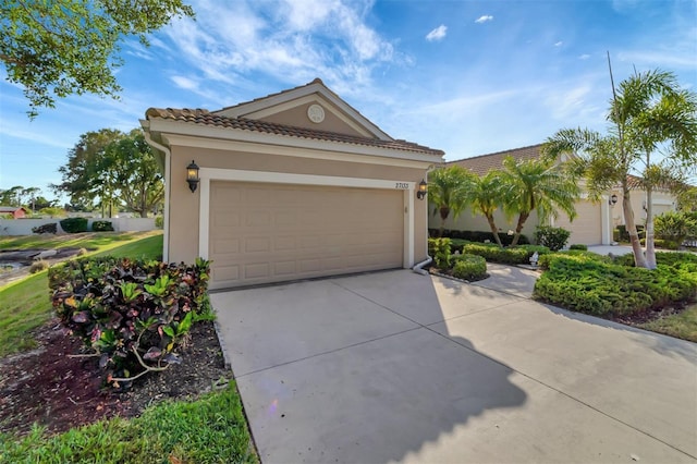 view of front of home with a garage