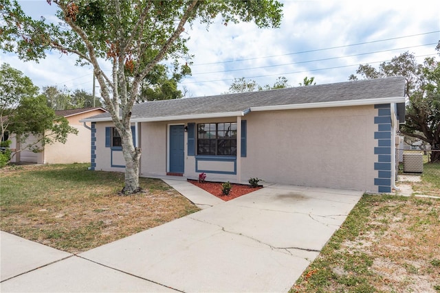 single story home with a front yard