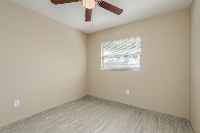 empty room featuring ceiling fan