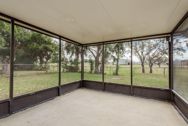 unfurnished sunroom featuring a wealth of natural light