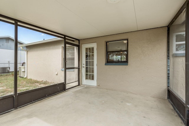 unfurnished sunroom featuring a healthy amount of sunlight