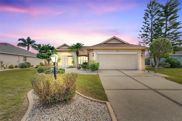 719 Winterbrooke Way, Sun City Center, FL 33573 - ranch-style house featuring a garage, concrete driveway, a yard, and stucco siding
