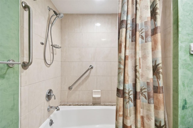 bathroom with shower / tub combo with curtain