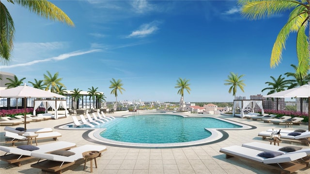 view of swimming pool featuring a patio and a gazebo