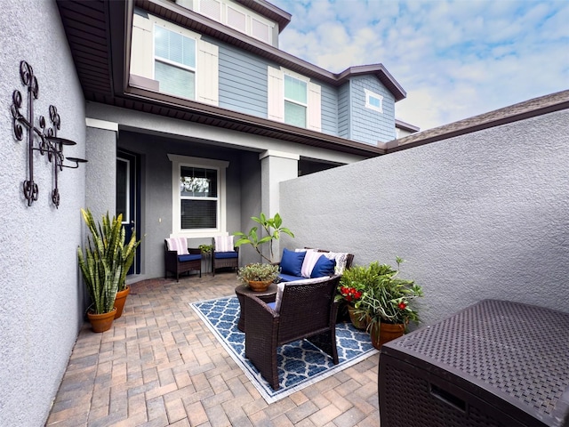 view of patio with an outdoor hangout area