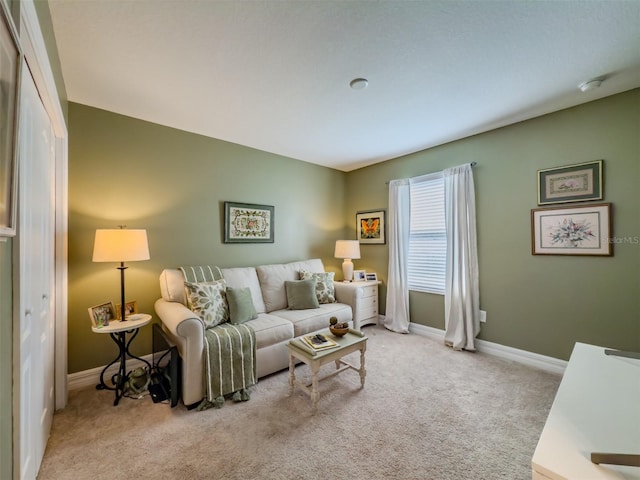 living room with light colored carpet