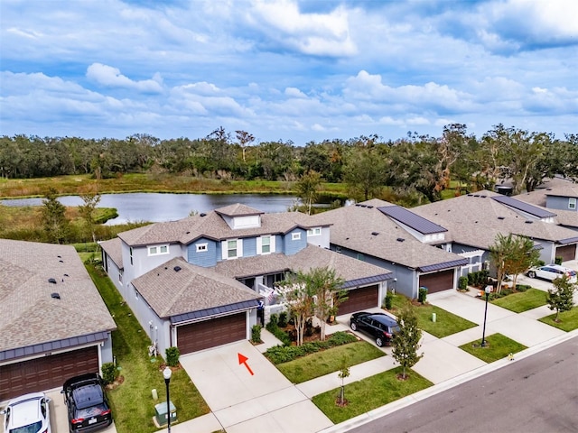 drone / aerial view featuring a water view