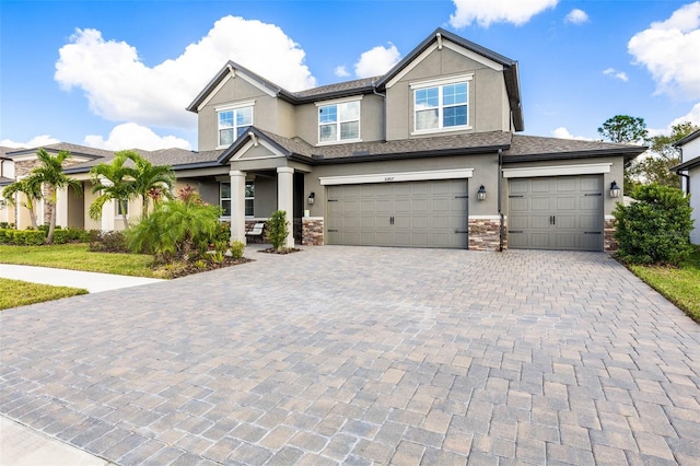 craftsman inspired home with a garage