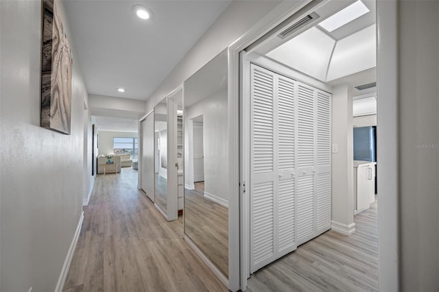 hallway featuring light hardwood / wood-style flooring