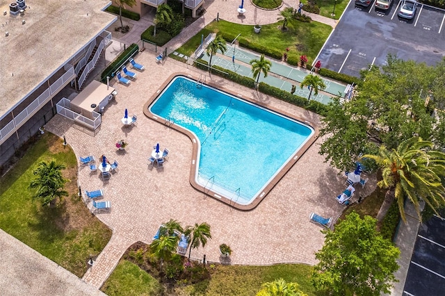 view of swimming pool with a patio