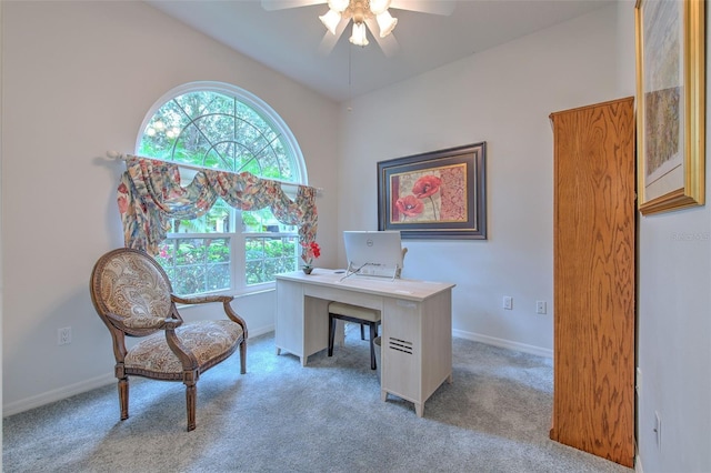 carpeted office with ceiling fan