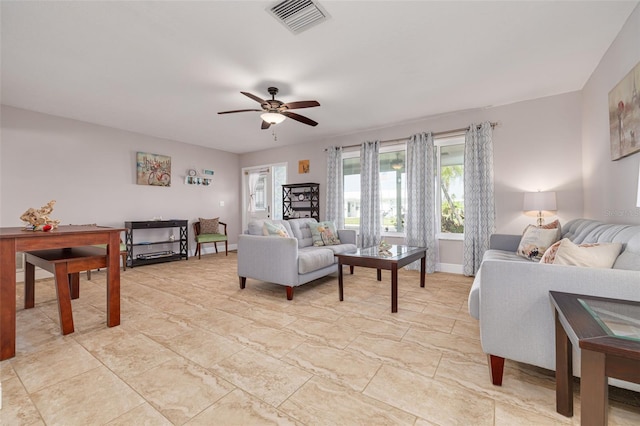 living room featuring ceiling fan