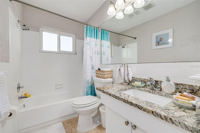 full bathroom featuring shower / bath combination with curtain, vanity, tile walls, tile patterned flooring, and toilet