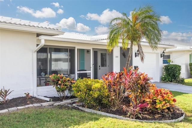 view of front of property featuring a garage