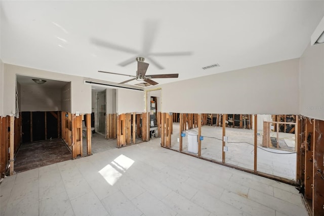 unfurnished room with ceiling fan