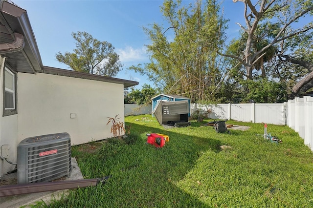 view of yard with central air condition unit