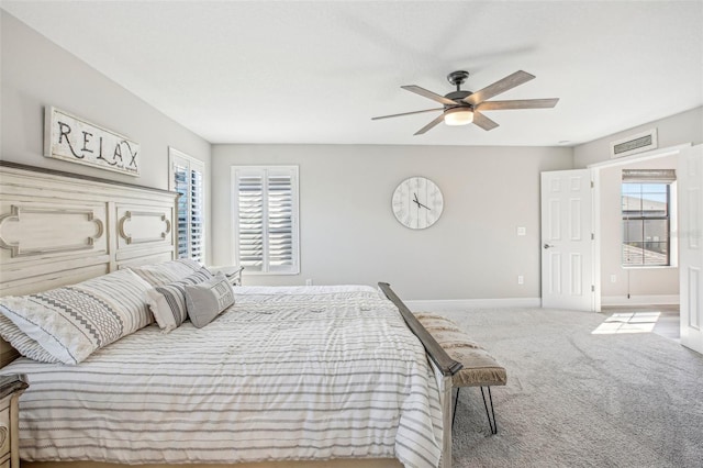 carpeted bedroom with ceiling fan