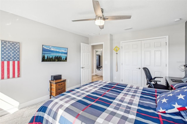 bedroom with a closet, carpet floors, and ceiling fan