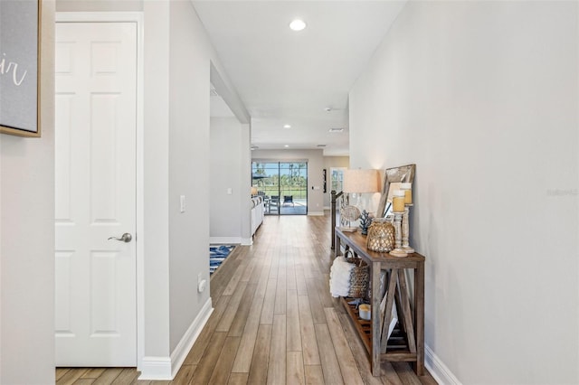 hallway featuring hardwood / wood-style flooring