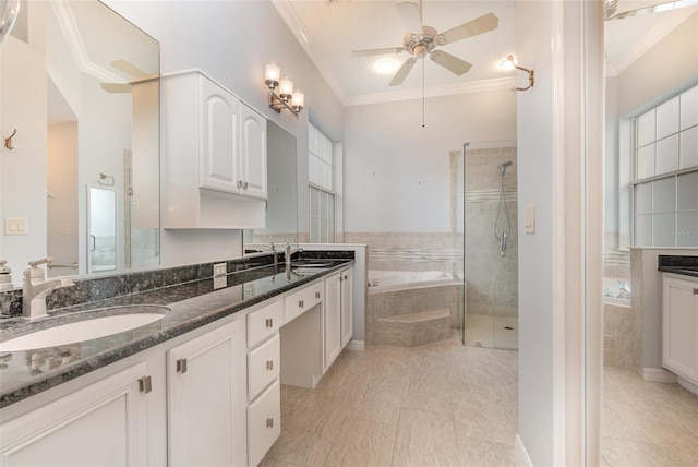 bathroom featuring independent shower and bath, vanity, ceiling fan, and crown molding