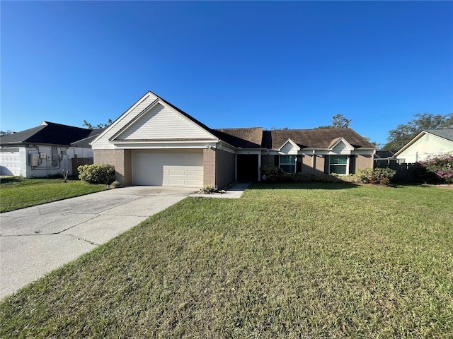 single story home featuring a garage and a front yard