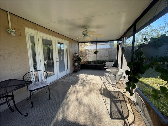 view of patio featuring ceiling fan and french doors